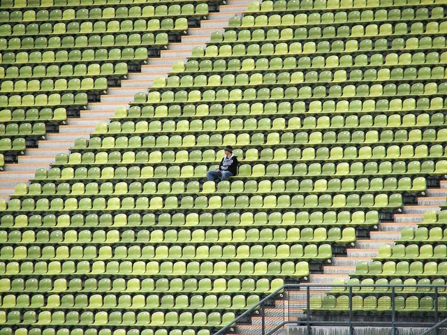 stadium, person, man, seats, chairs, olympic stadium, lonely, alone, sitting, sit, rows of seats, solitude, solitary, stadium, lonely, lonely, lonely, alone, alone, alone, alone, alone. How US sports leagues, teams and unions handle an athlete death announcement