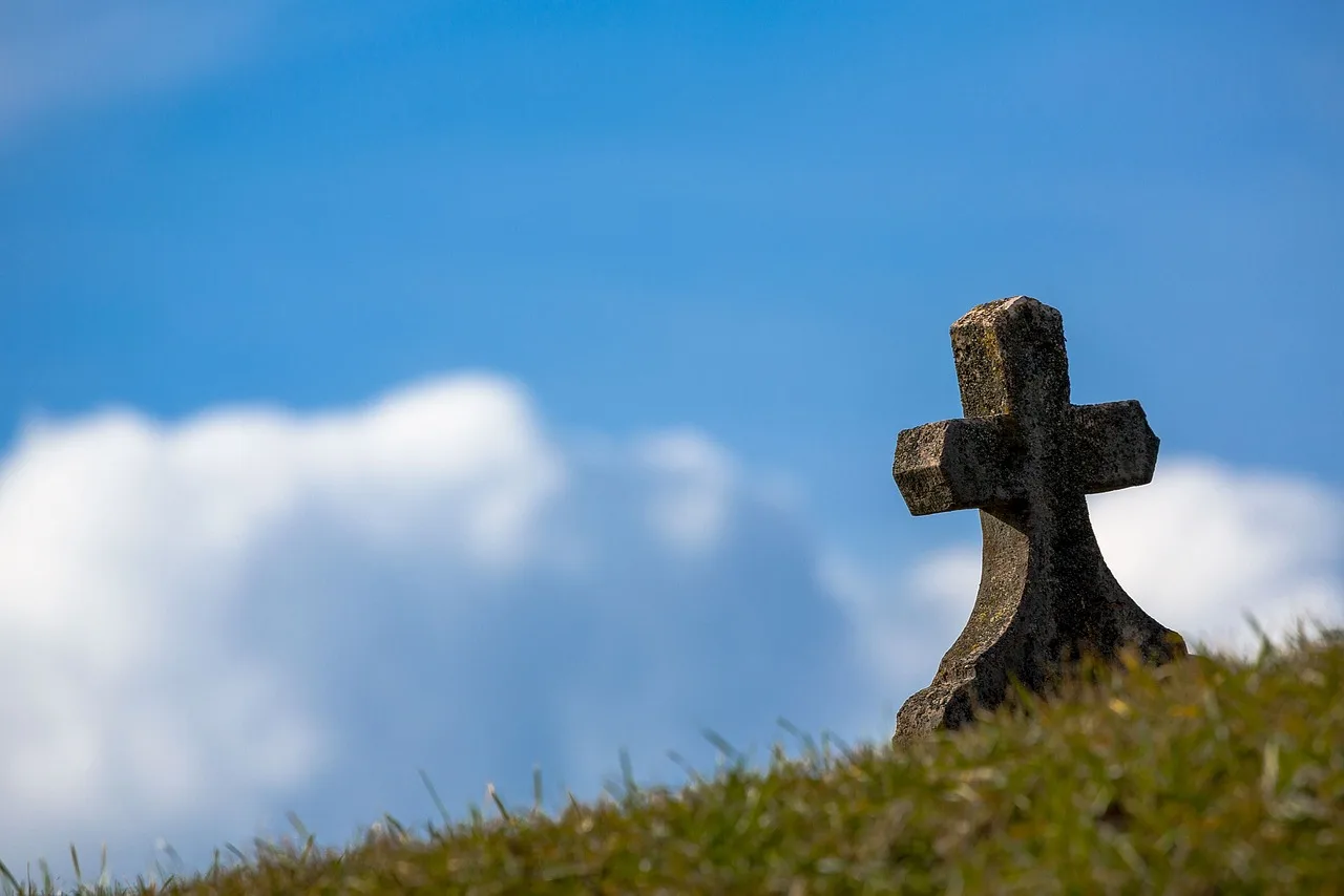 grave, sky, cross, nature, old, stone, christian, christianity, religion, tomb, cemetery, graveyard. Tracing a musician's death through Nashville and New Orleans memorial customs